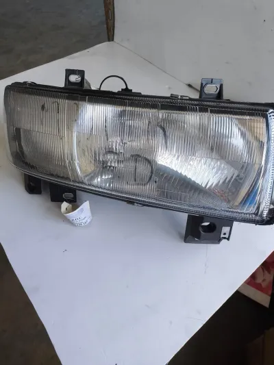 Farol FD Renault Master I referência 7700352104